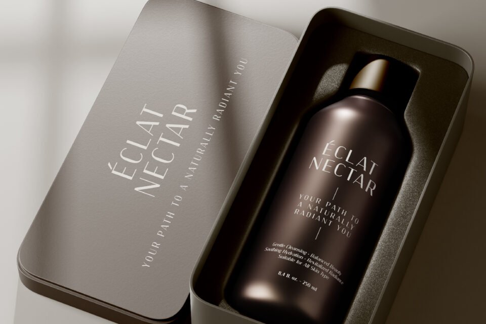 Luxury product packaging for "Éclat Nectar" with Kinsley Sans font used on the bottle and box, demonstrating a premium aesthetic.