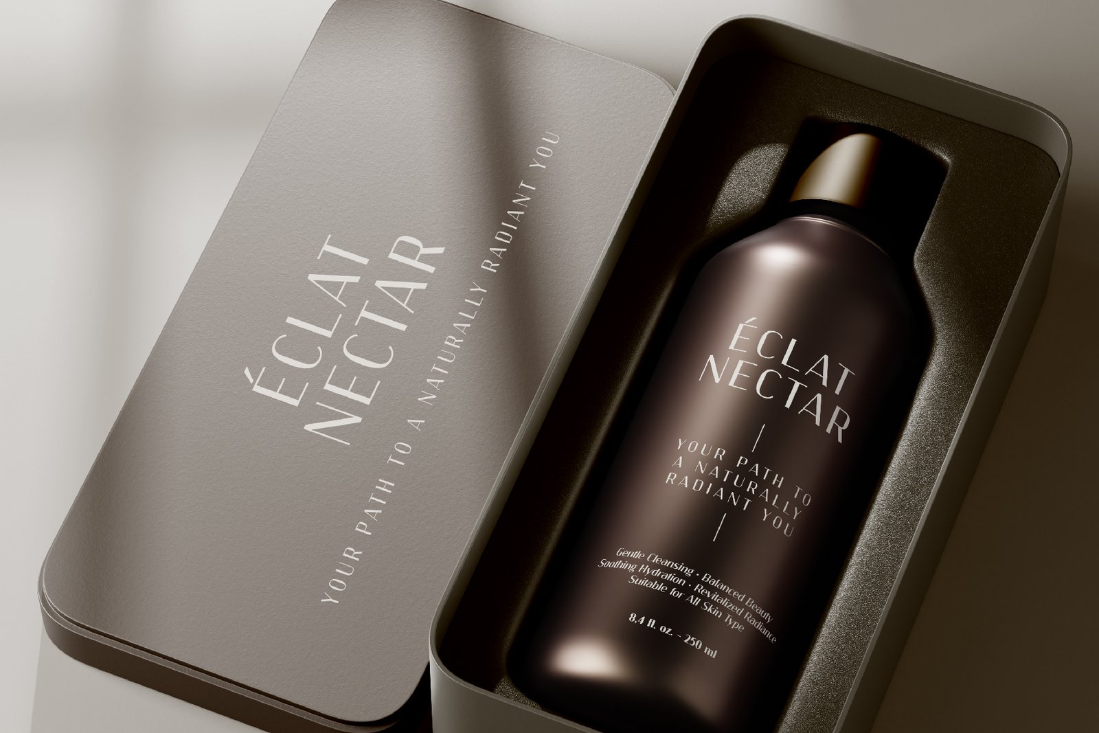 Luxury product packaging for "Éclat Nectar" with Kinsley Sans font used on the bottle and box, demonstrating a premium aesthetic.