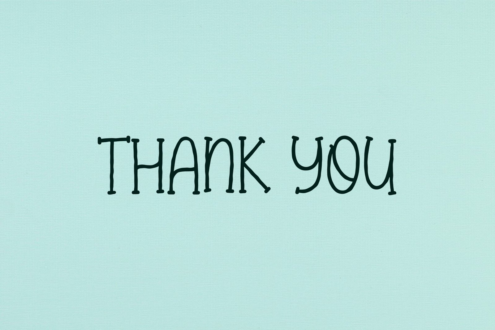 The words "Thank You" written in the Elabora font on a light blue background. Title: Thank You in Elabora Font